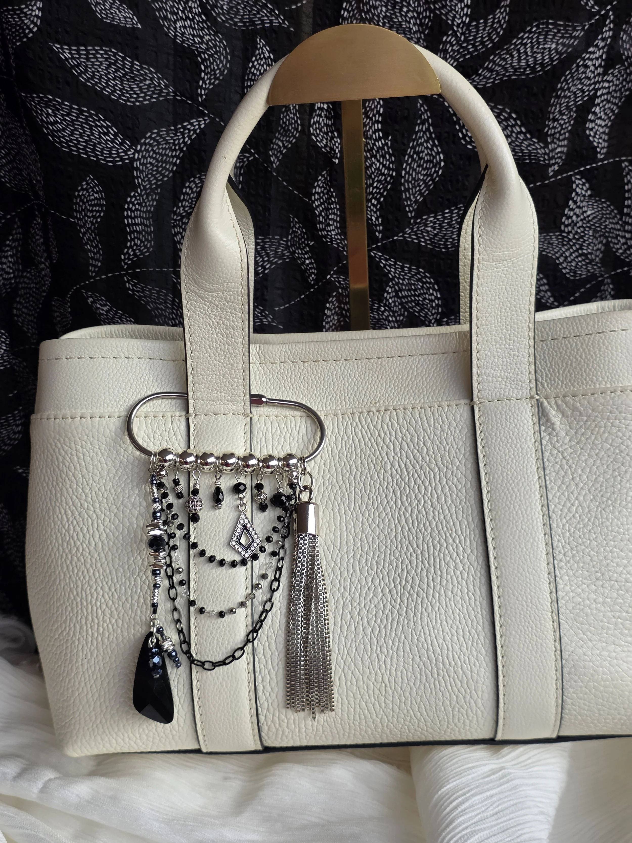 Black and silver handmade bag charm with Swarovski crystal and silver toned tassel — The Ruth by Charm & Deligh