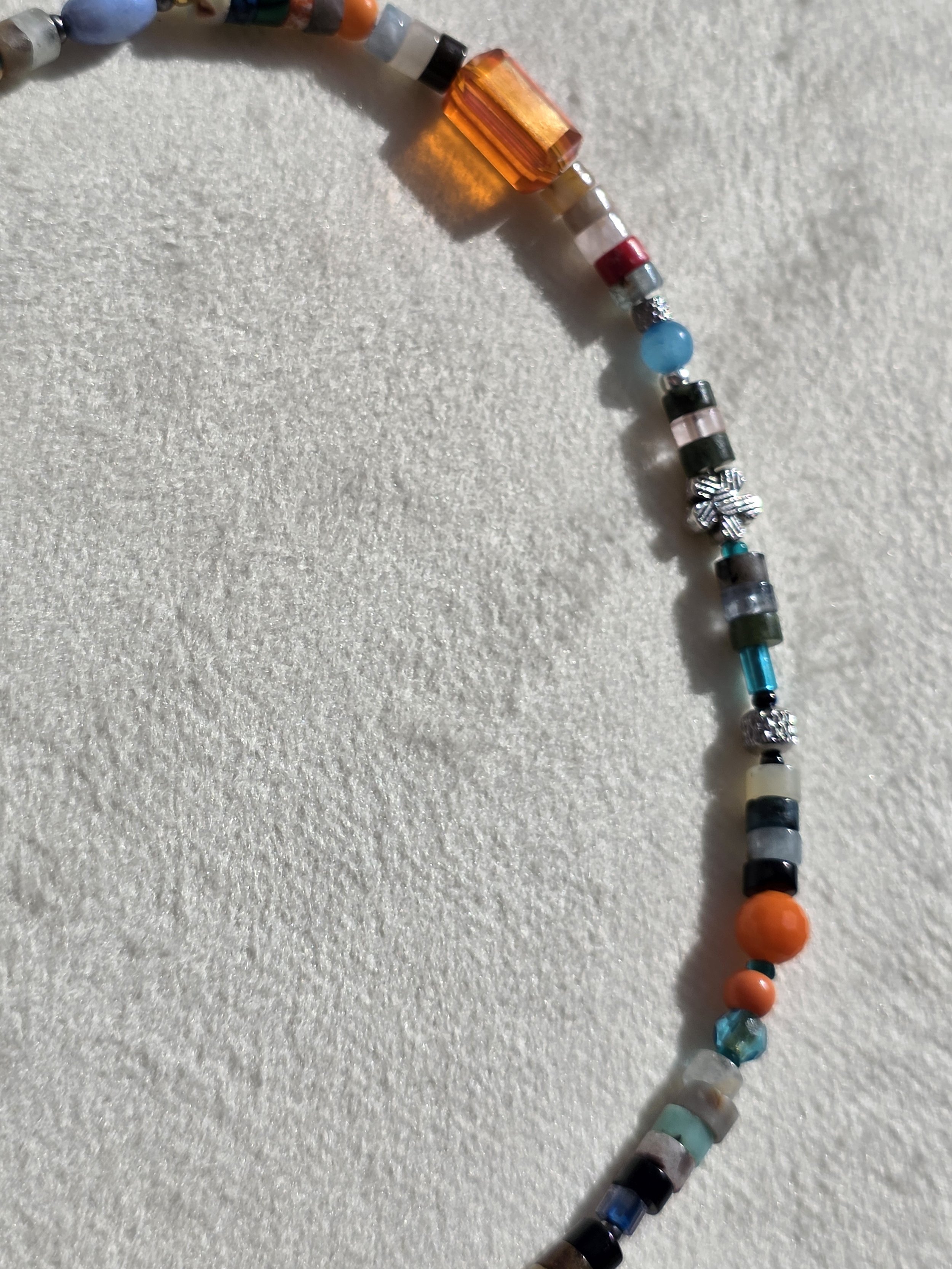 Close-up of beading on The Wanderer gemstone heishi necklace