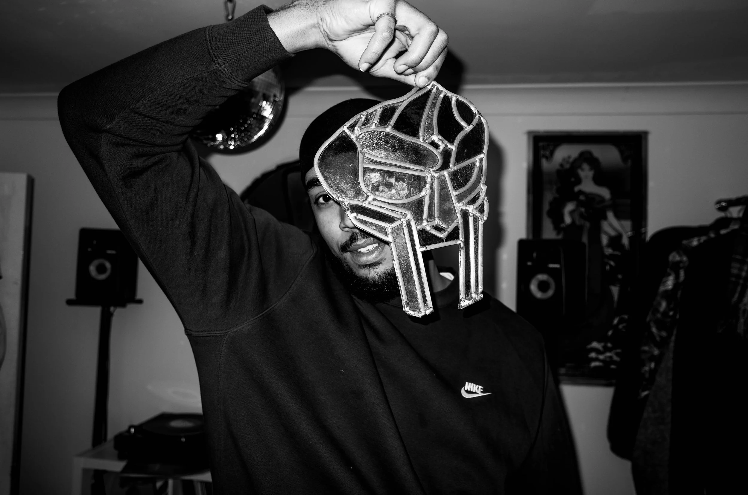 Harry Luego, with an MF DOOM stained glass window.