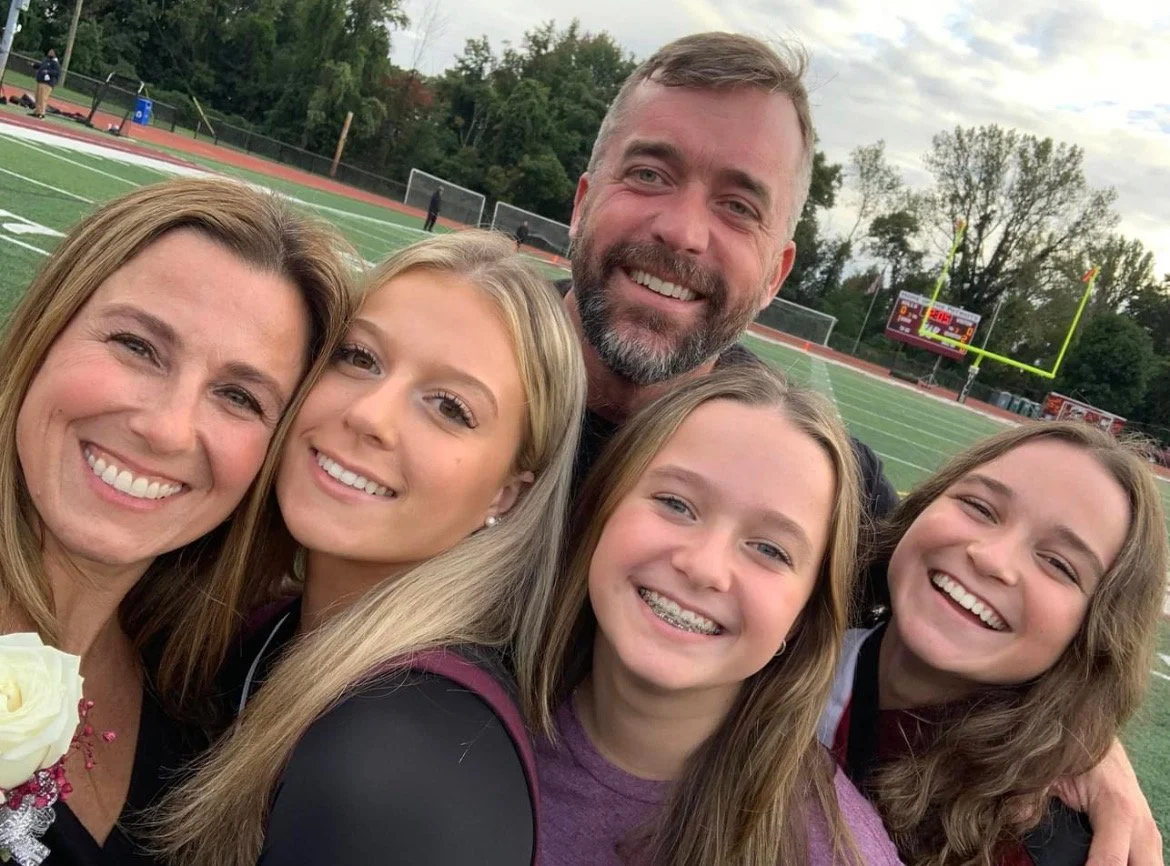 Photo of Dennis Marnick, Cathy Marnick and three daughters