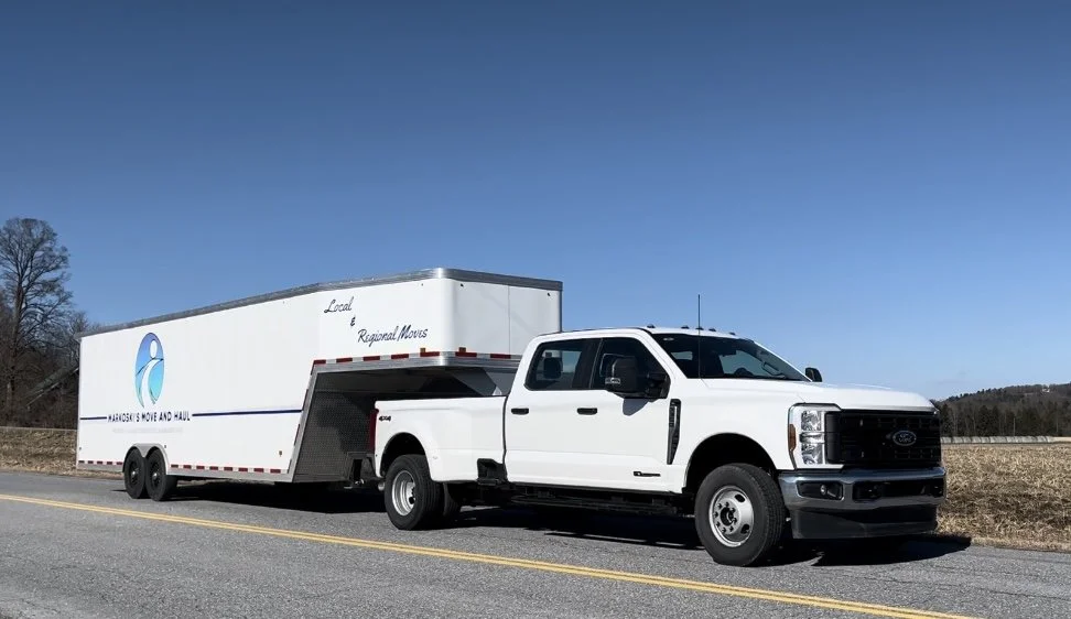 Markoski’s Hauling Ford F-350 dually with a branded enclosed gooseneck trailer