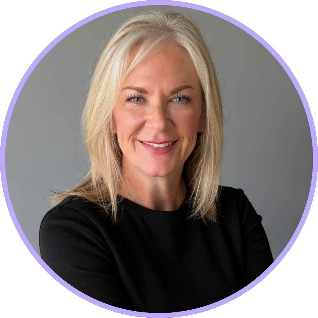 Paula Severns, wearing a black top with medium-length blonde hair and a warm smile.
