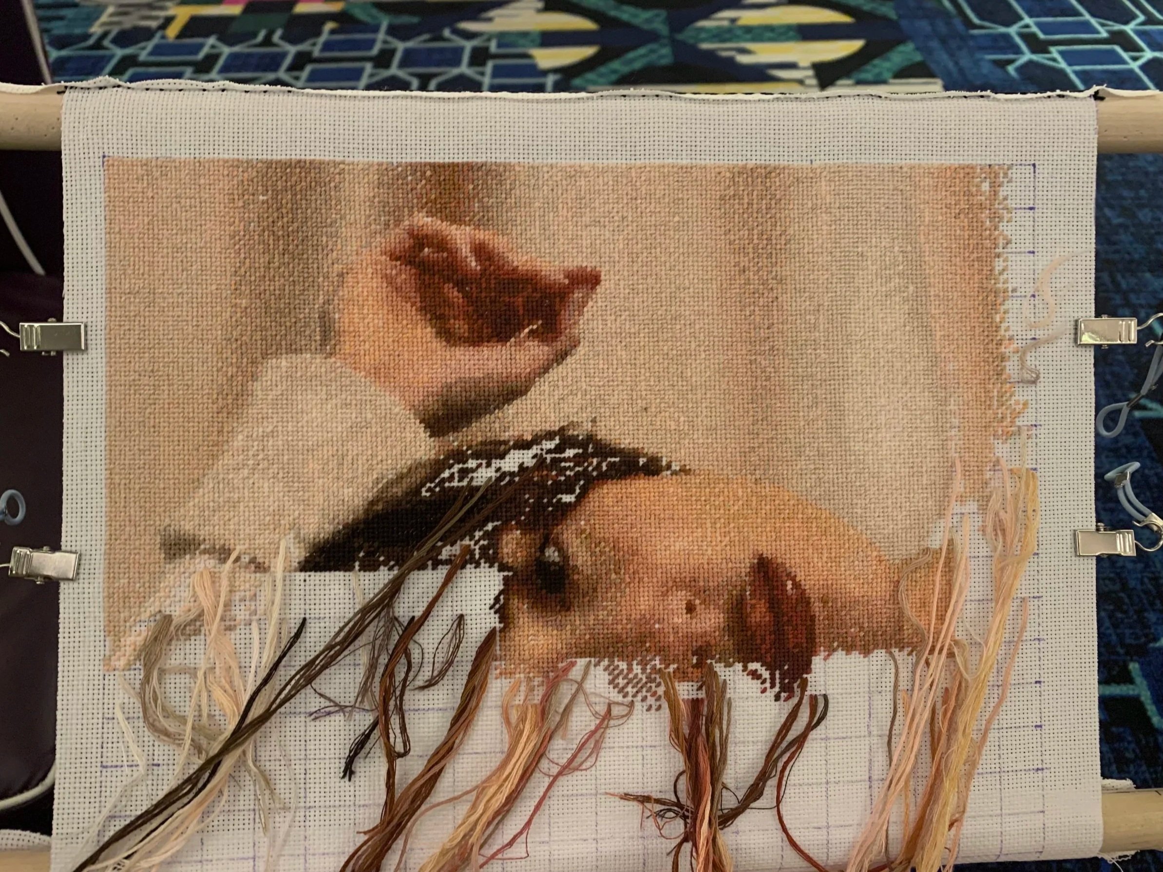 hand-stitched needlepoint portrait in progress (during travel)  at the Cosmopolitan in Las Vegas, NV
