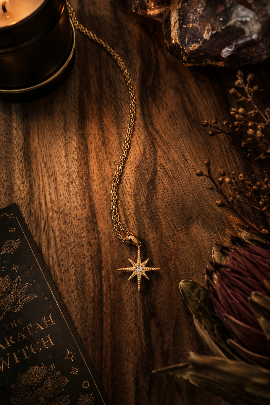 Starburst+Necklace+Gold+displayed+made+by+flax+barn+sold+by+the+waratah+Witch+copyright+image.png