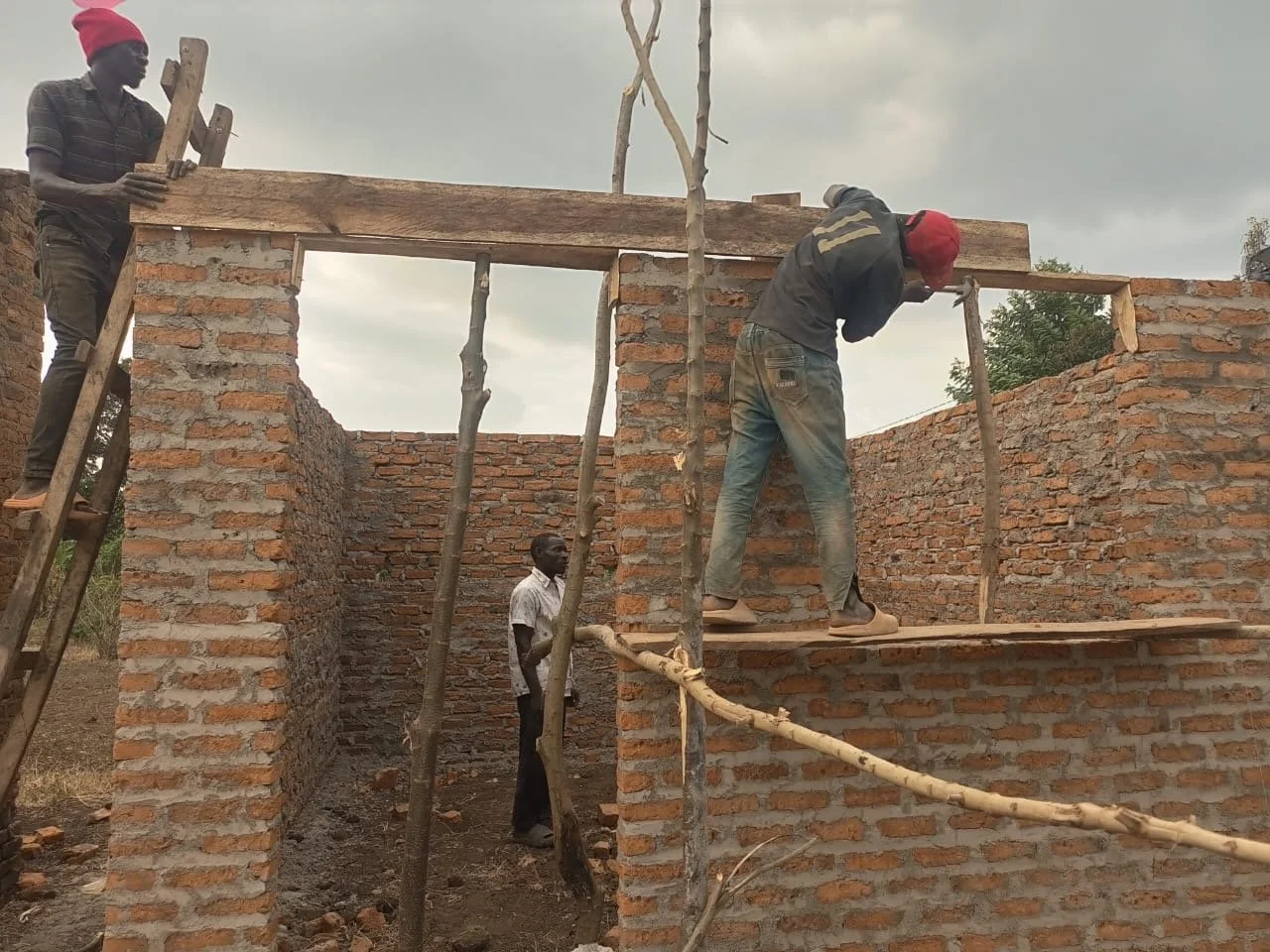 2026: Construction of the new brick chicken coop is underway. In Uganda, bricks are the most common and cost-effective building material, making them a durable and affordable choice for long-term structures.