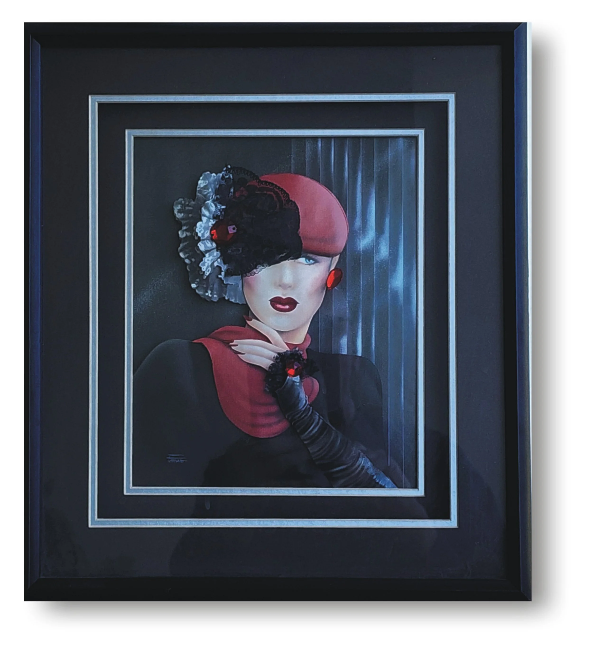 Framed portrait of a woman with vintage hairstyle, wearing red and black attire, red hat, and large matching jewelry, set against a curtain background.