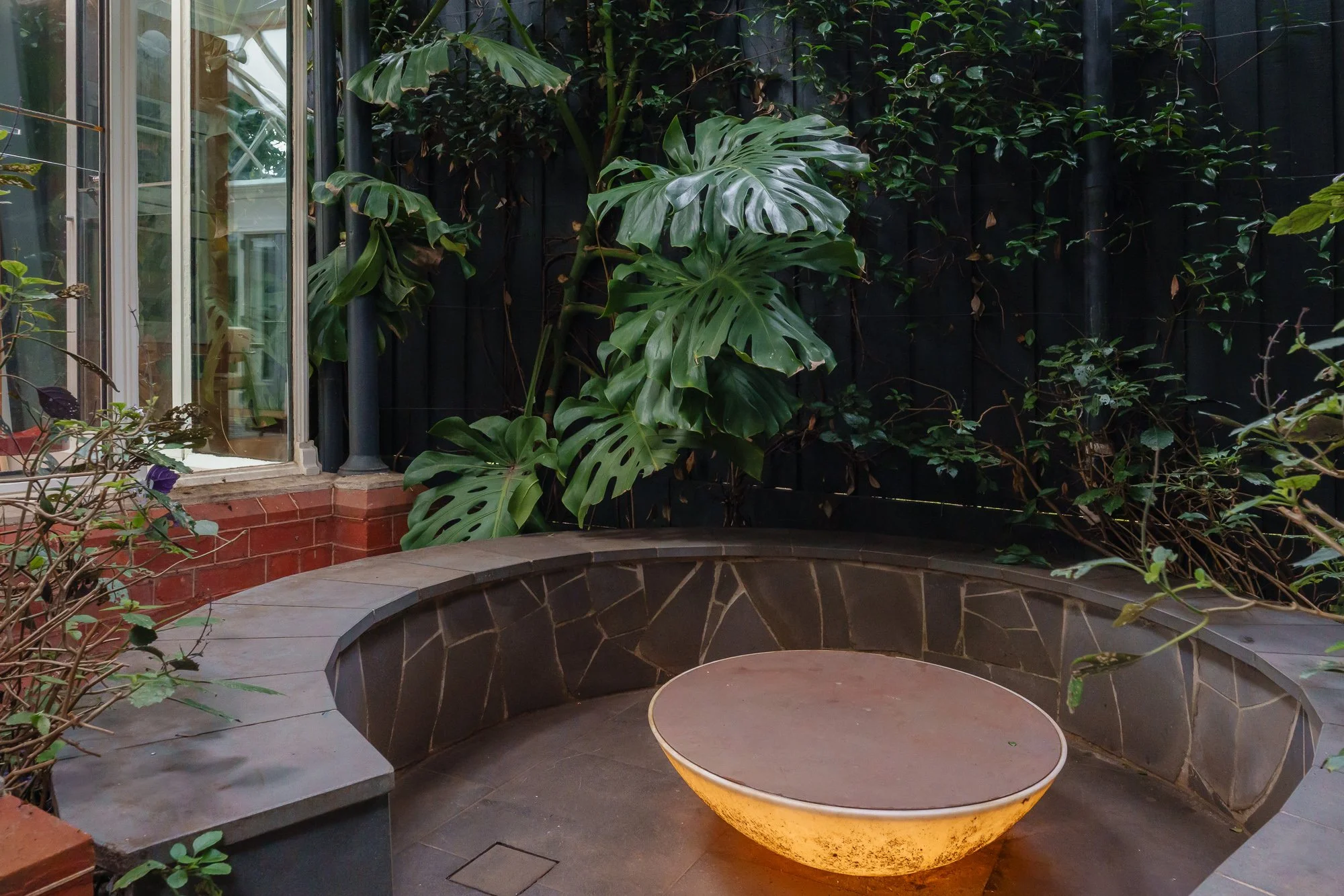 Conversation pit in the garden at Conservatory Residency located in Caulfield North