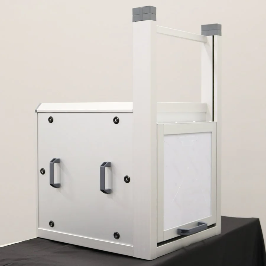 box contenitivo per lavorazioni laser con sportello a contrappesi integrati bilanciato in profilo strutturale di alluminio
