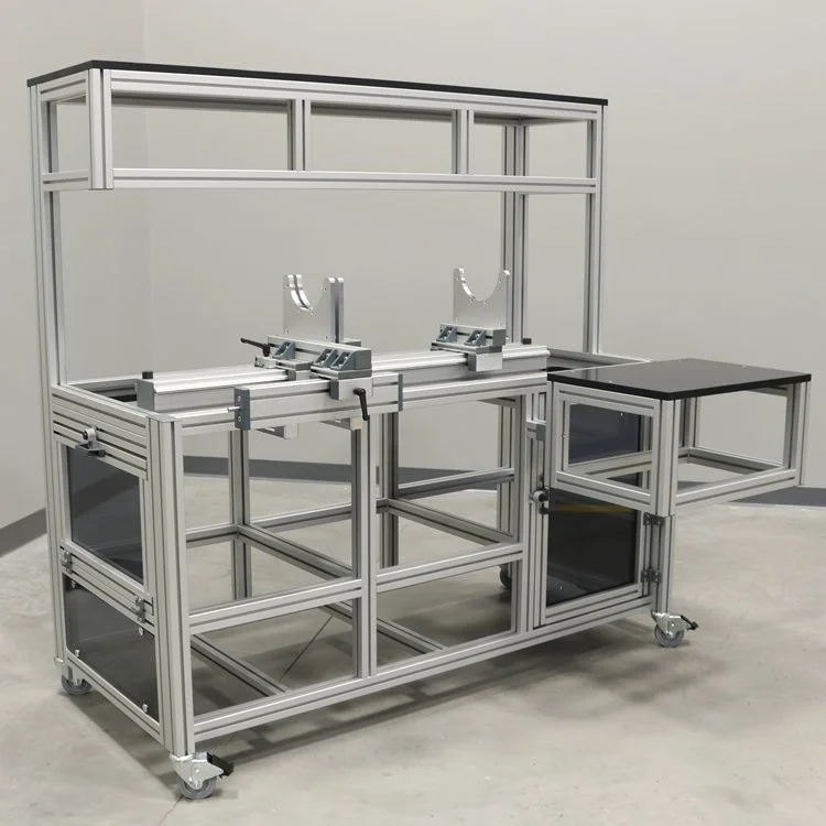 Struttura in alluminio strutturale con guide e supporti per collaudi test e o montaggi, dotata di cassetti e ripiani, con ruote per spostamento, banco di collaudo in alluminio strutturale. Workspace o banco di lavoro