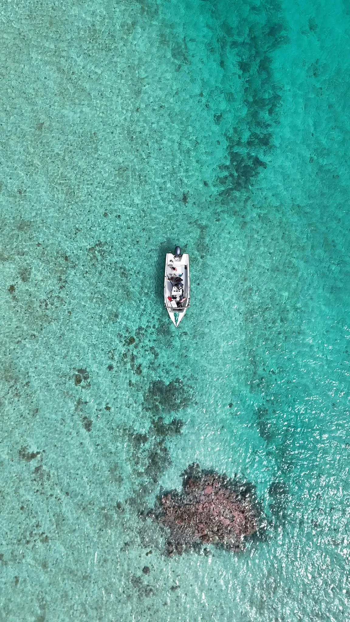 Boat at Anaa from the air.jpg
