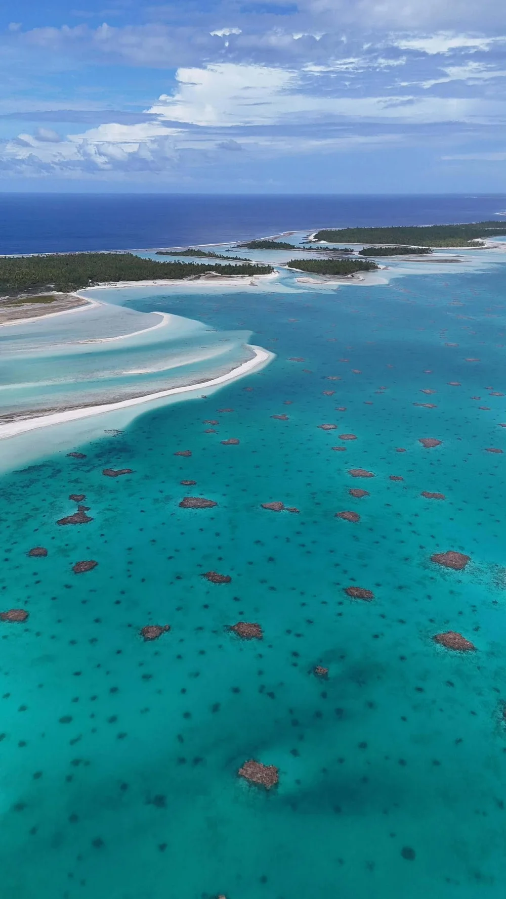 Coral bommies and shallow sand margins in Anaa’s lagoon