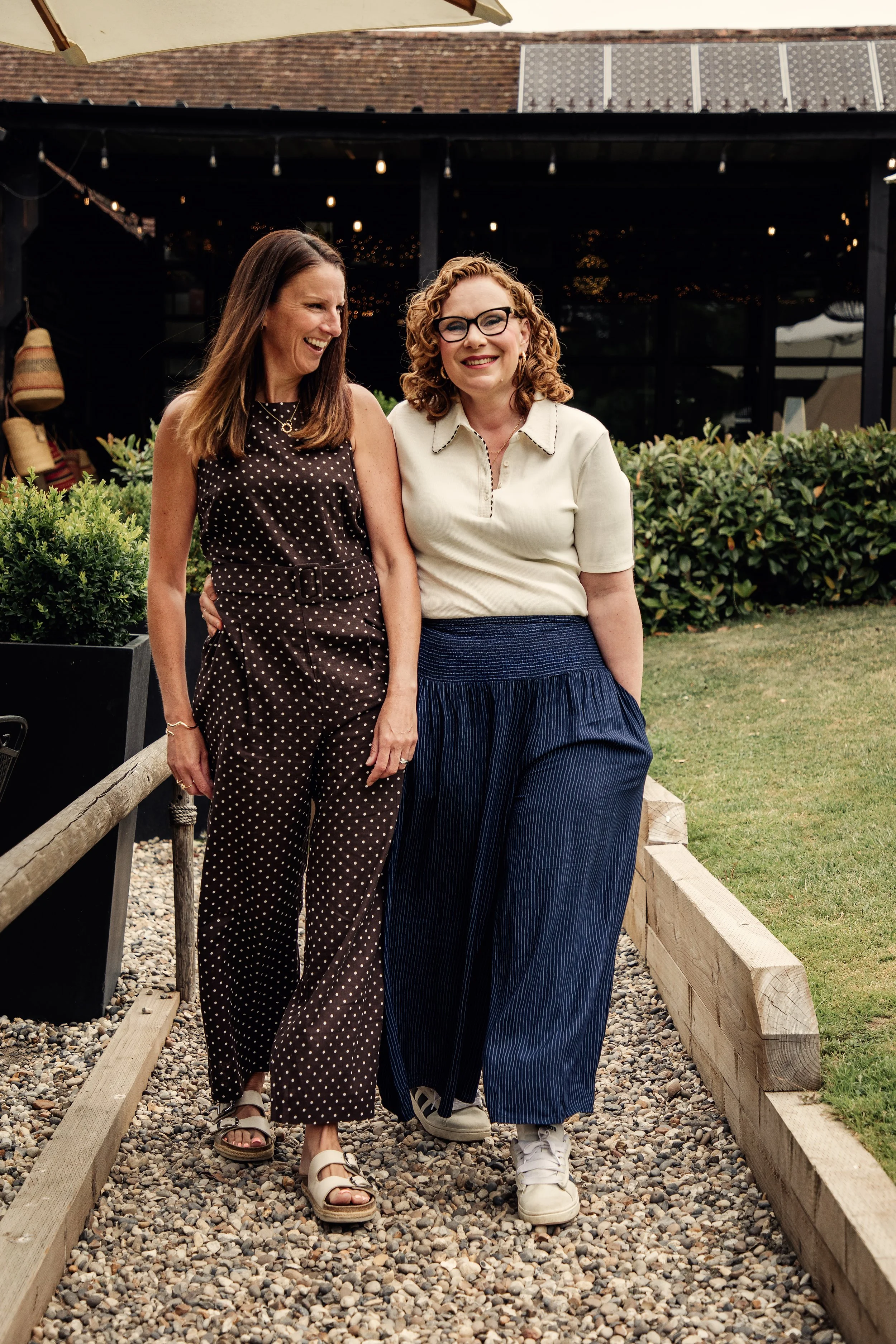 Emma and Caroline from Urbanberry Recruitment together outdoors.