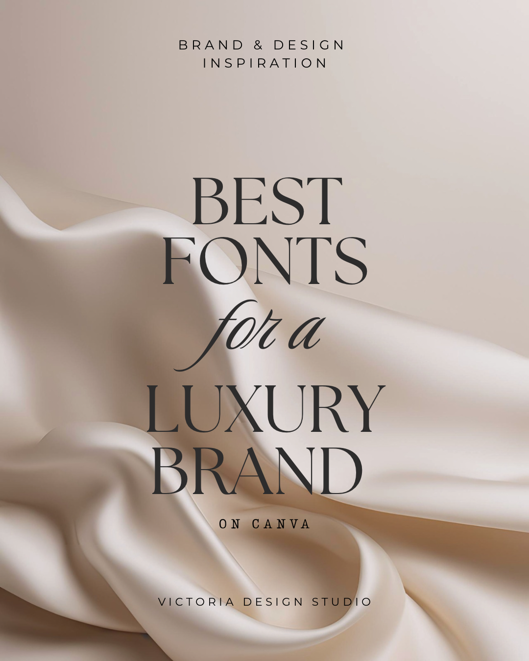 Text overlay on a silky fabric background promoting best fonts for luxury brands by Victoria Design Studio.