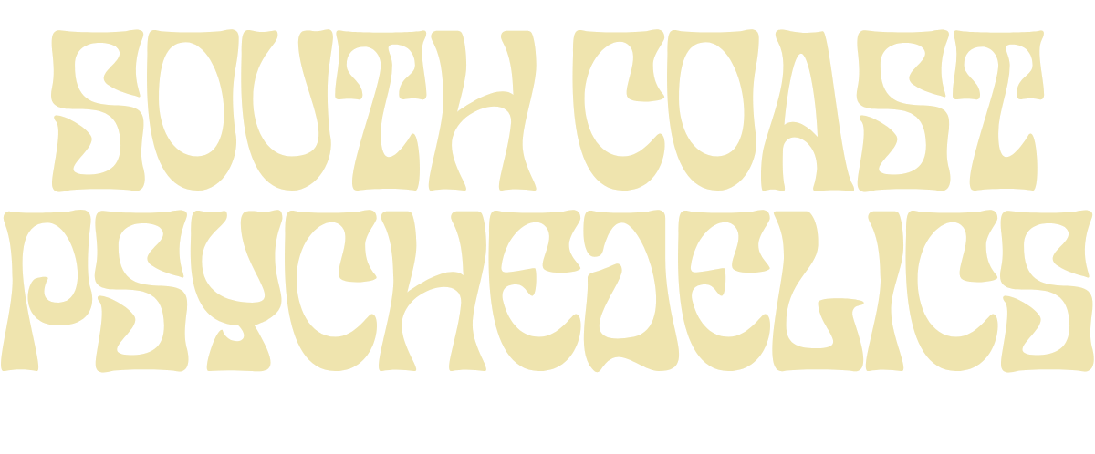 Stylized text reading 'South Coast Psychedelics' with a wavy, artistic font in light yellow against a black background.