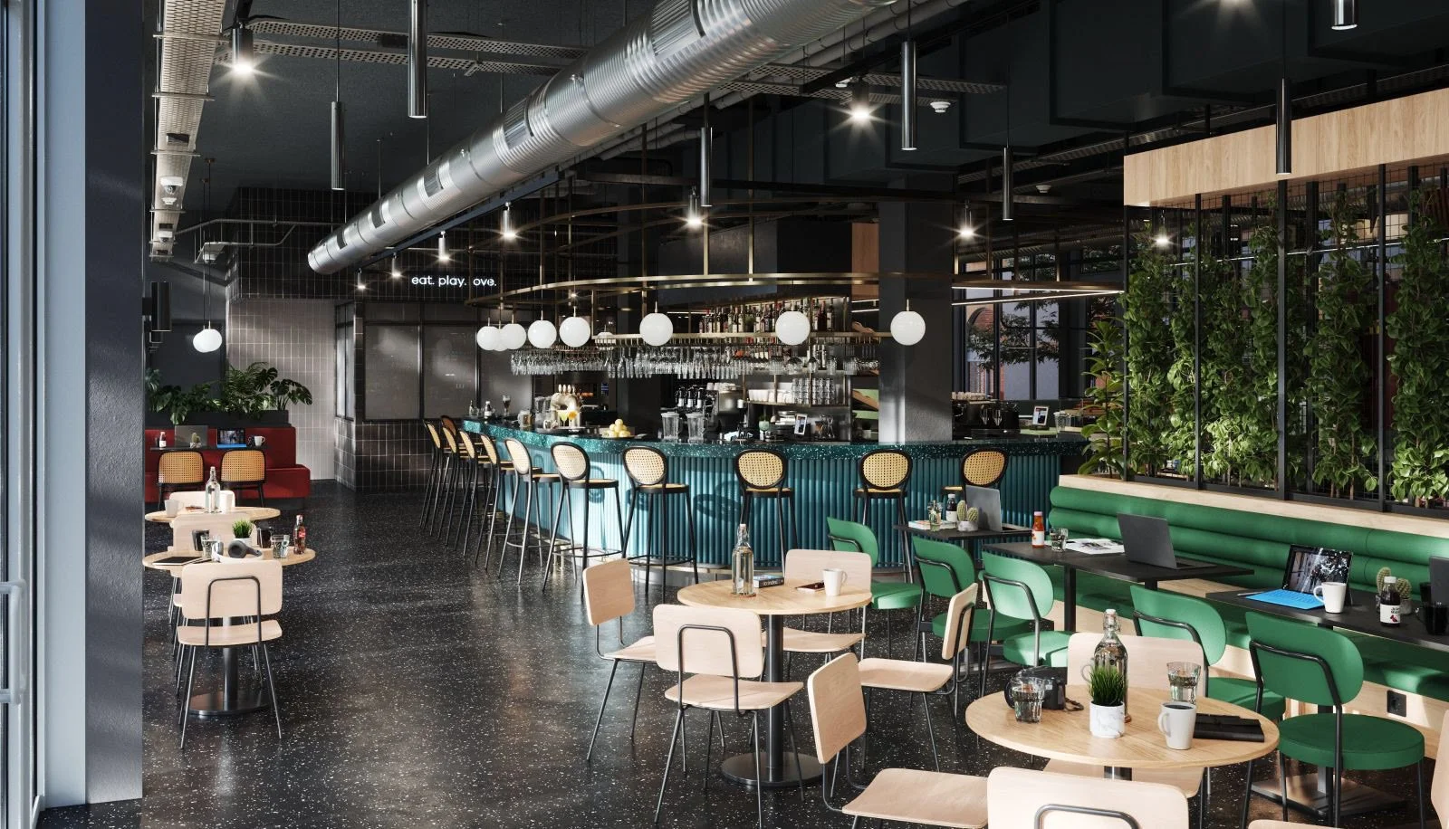 Intérieur d'un bar moderne avec des tables en bois, un comptoir au centre avec des tabourets et une cuisine visible en arrière-plan, décoré avec des plantes vertes et un éclairage contemporain.