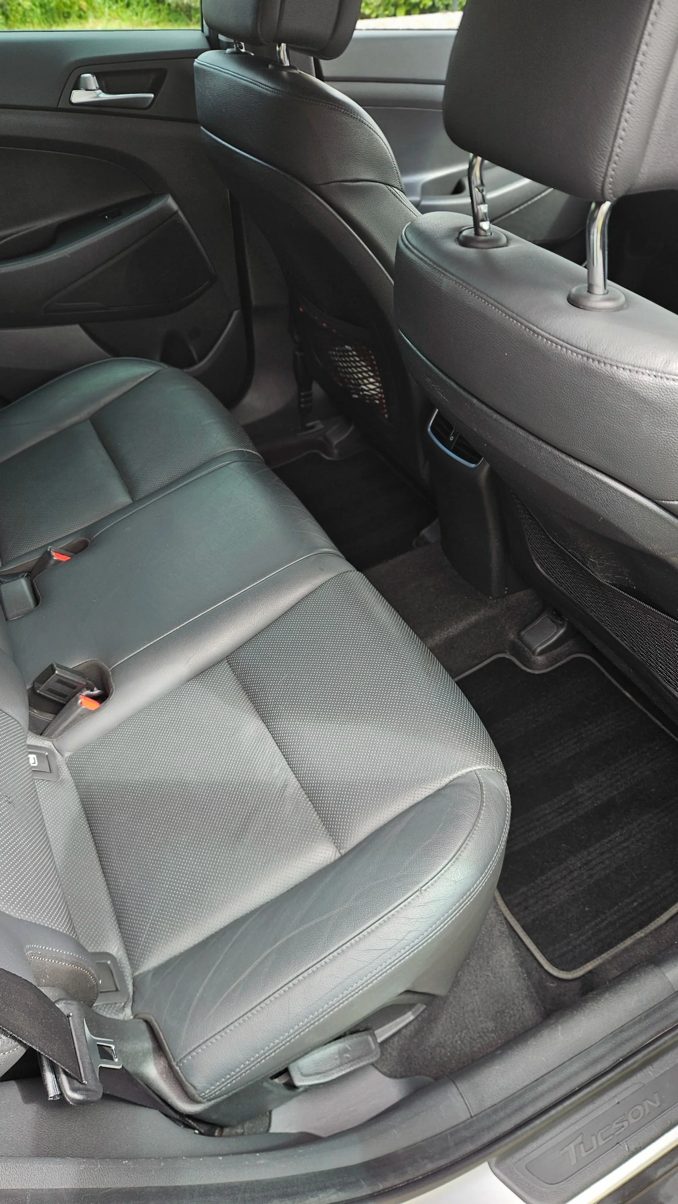 The backseats of a hyundai after a deep premium full interior mobile detail, including a full vacuum, steam sanitization, heavy stain extraction, in preparation for the NCT in Blackrock, Co. Louth, by North East Auto Detailing.