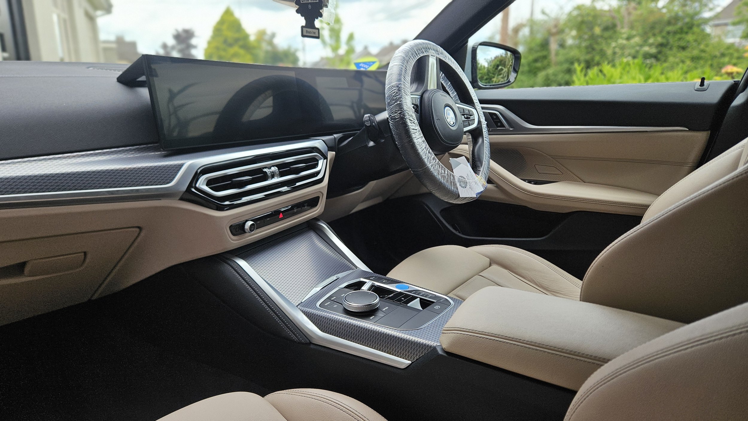 Interior detail by North East Auto Detailing for 2023 BMW I4 on Avenue Road in Dundalk. The Interior Detail included a deep clean, vacuum, scrubbing of the leather, steam sanitisation, stain removal from upholstery and floor mats and removal of grime