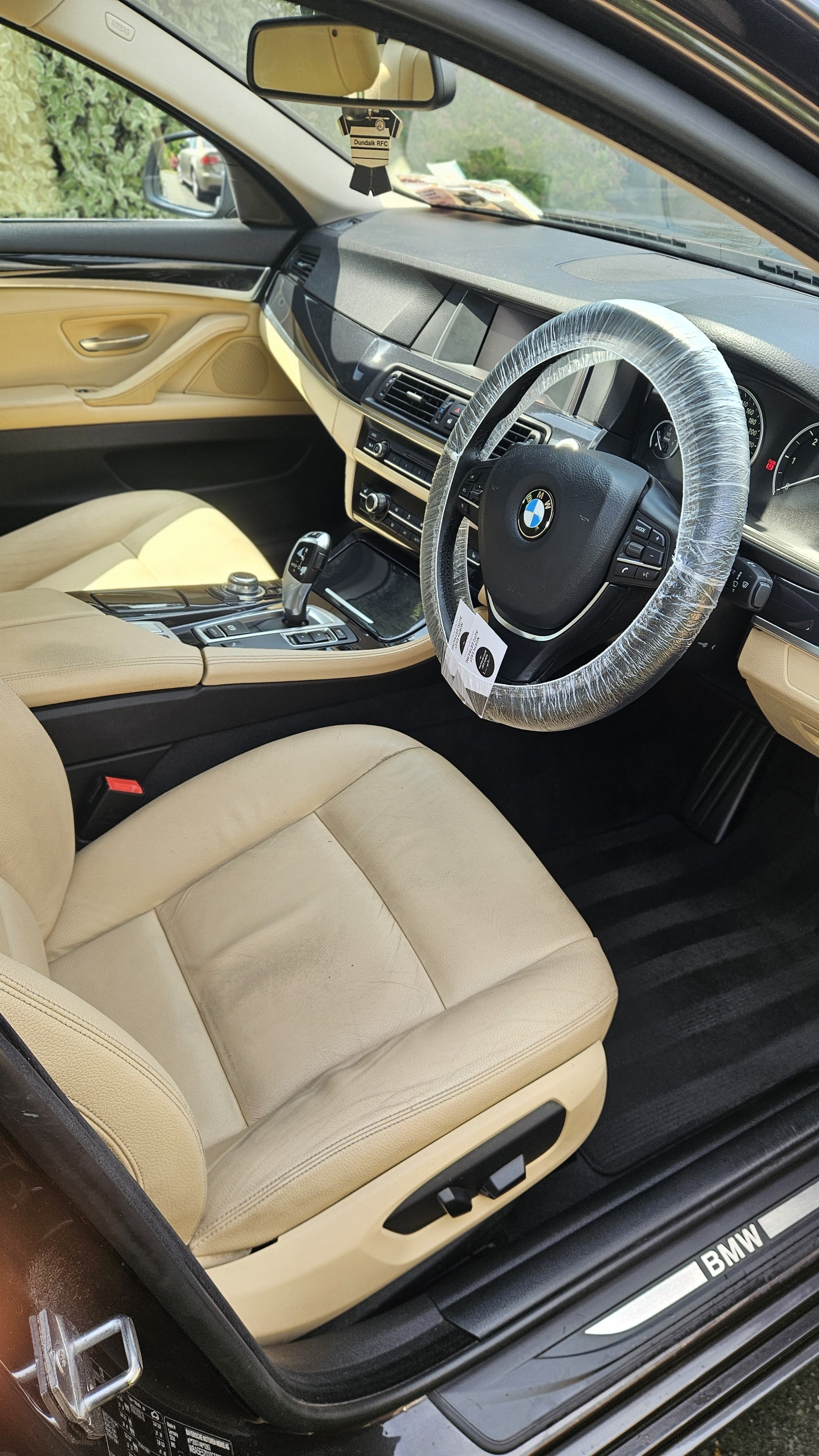 Steam-sanitised steering wheel and dashboard, 2024 BMW 4 Series — North East Auto Detailing