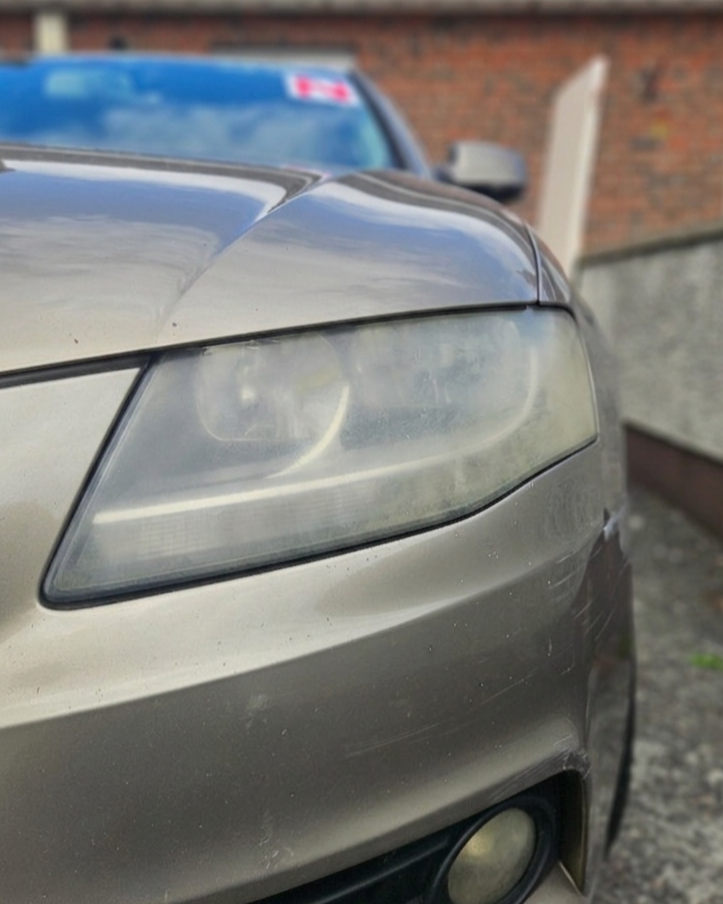 Oxidised and yellowed car headlight before restoration by North East Auto Detailing, Blackrock, Co. Louth