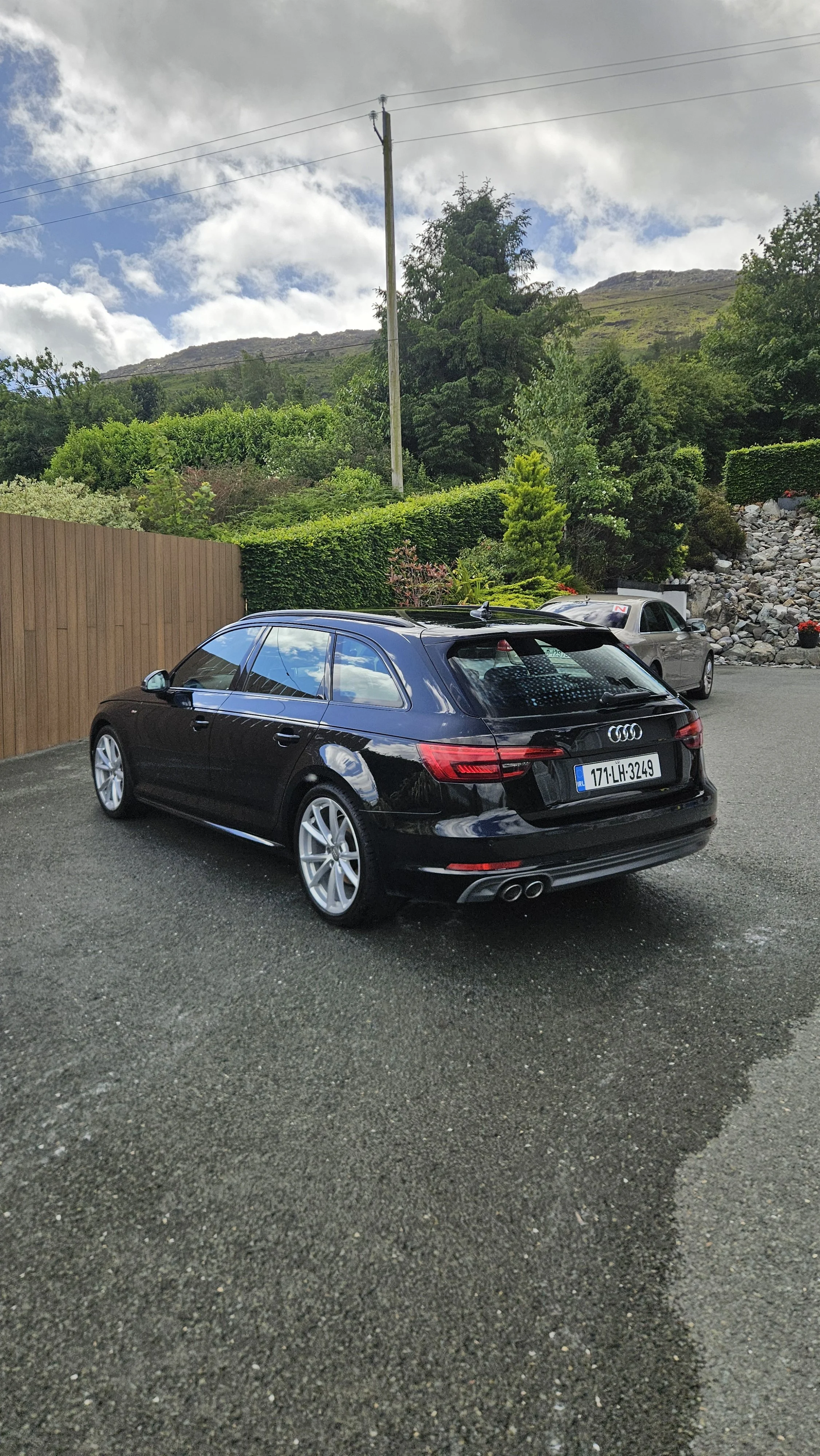 Exterior detail by North East Auto Detailing for a Audi A4 Avant in Carlingford in County louth. This detail included removal of built of road film, brake dust and muck from country driving. The detail revealed the deep gloss of the black paint.