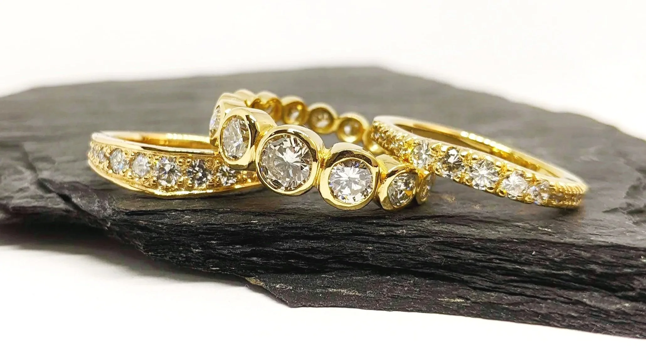 Trio of stacking rings created using heirloom gold and antique diamonds