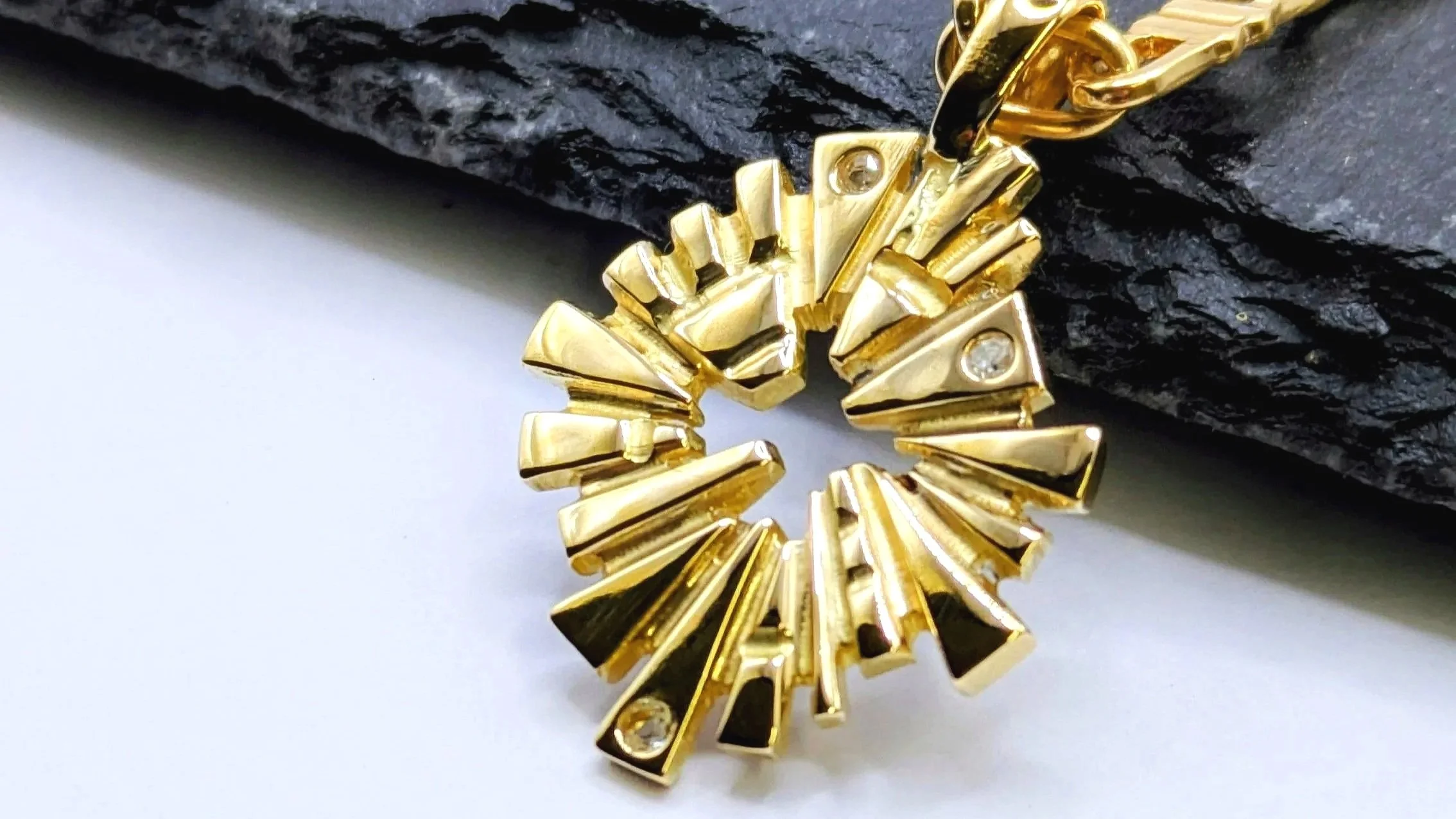 Baptism necklace to represent the sun made from heirloom gold and diamonds