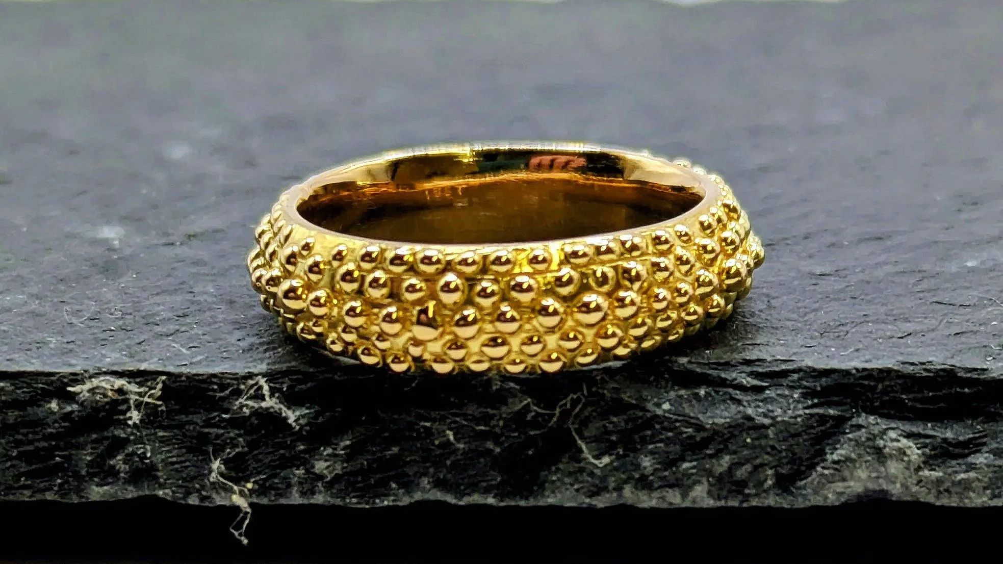 A gothic inspired ring made from heirloom gold