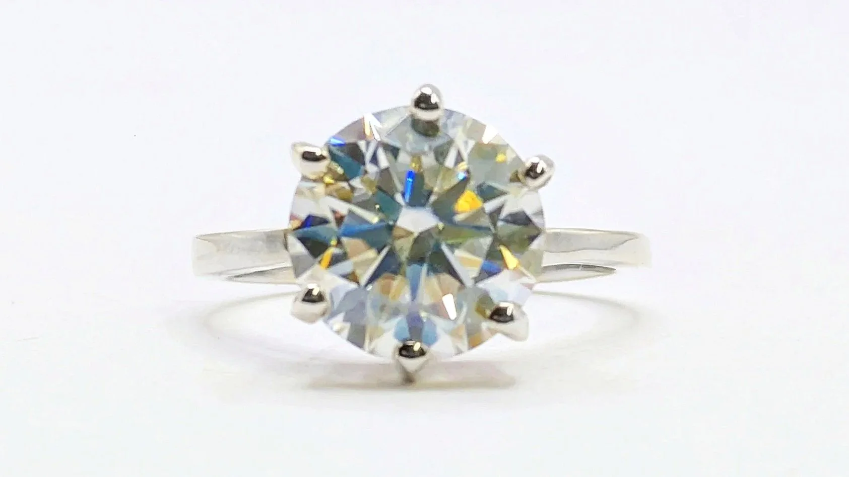 Bright and Bold. An 18ct heirloom gold solitaire ring with a statement 10mm moissanite.