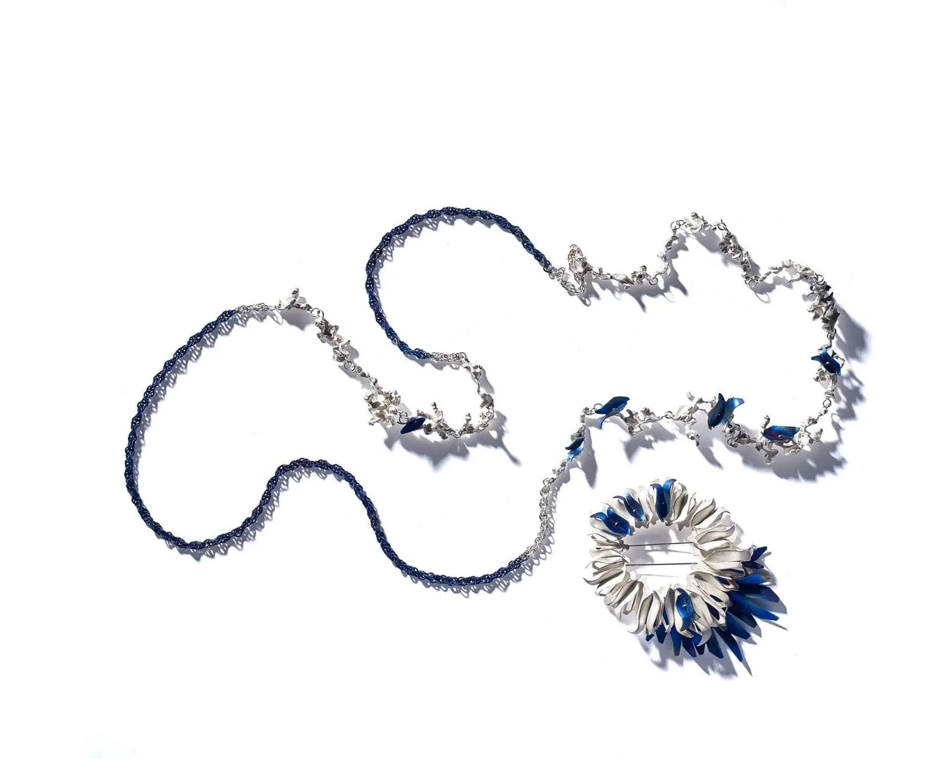Depletioned silver and fire painted Titanium neck-piece and broaches