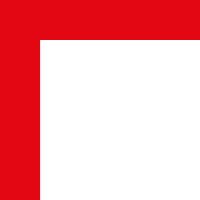 Black film camera with a red background.