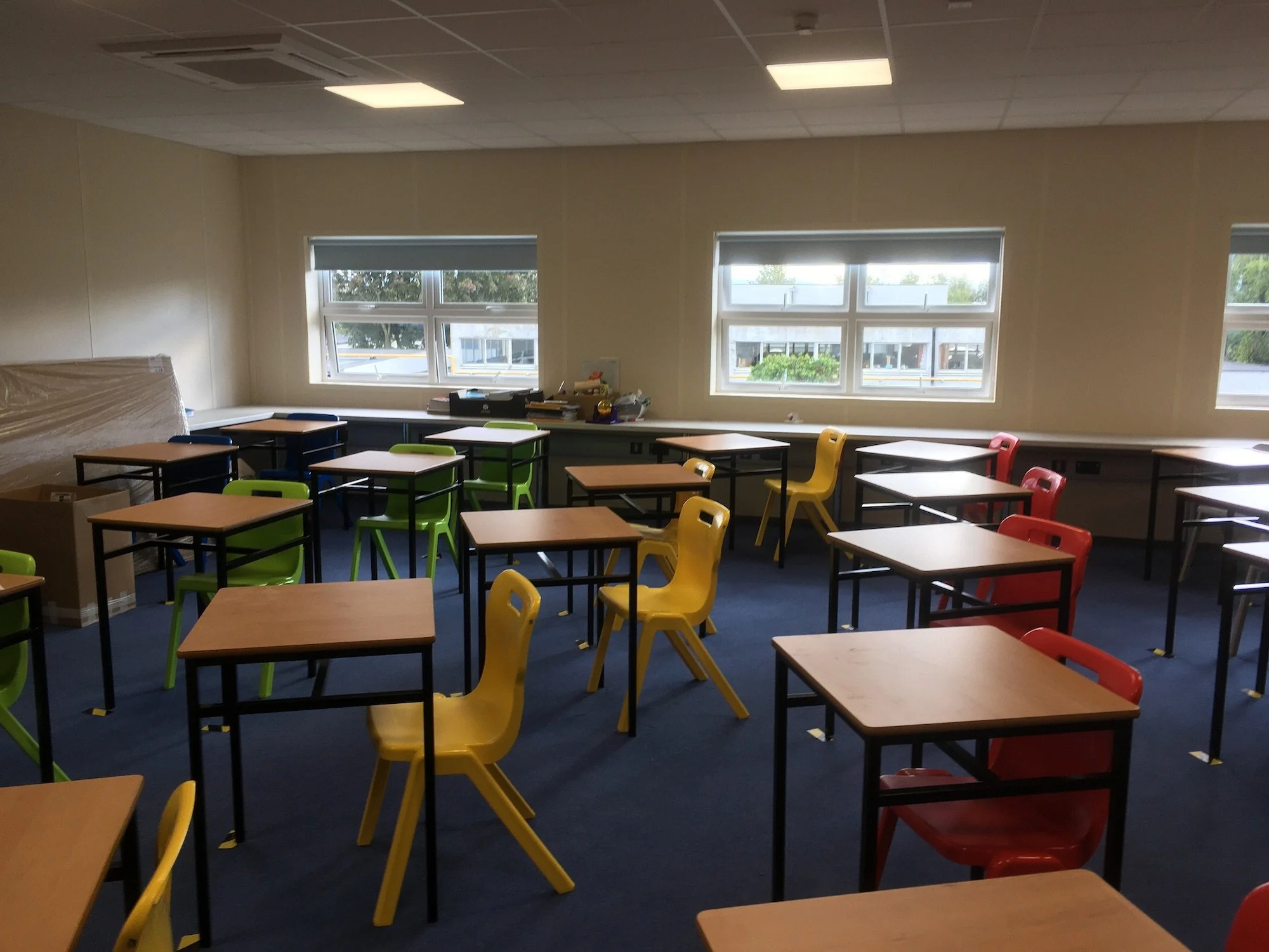 Clonkturk School Classroom with colourful chairs by JSA Architects Dublin.JPG