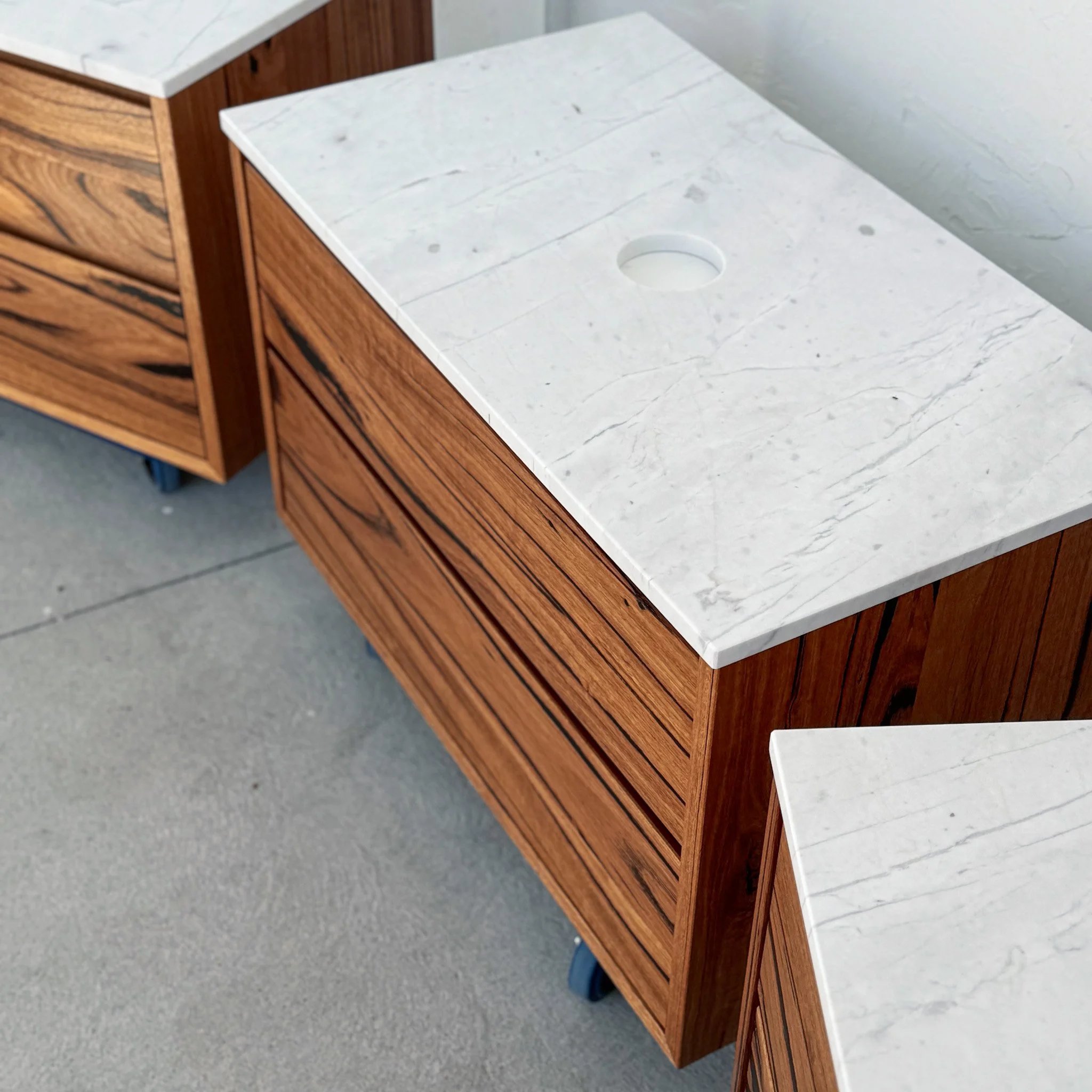 Timber vanity, recycled hardwood, stone top  