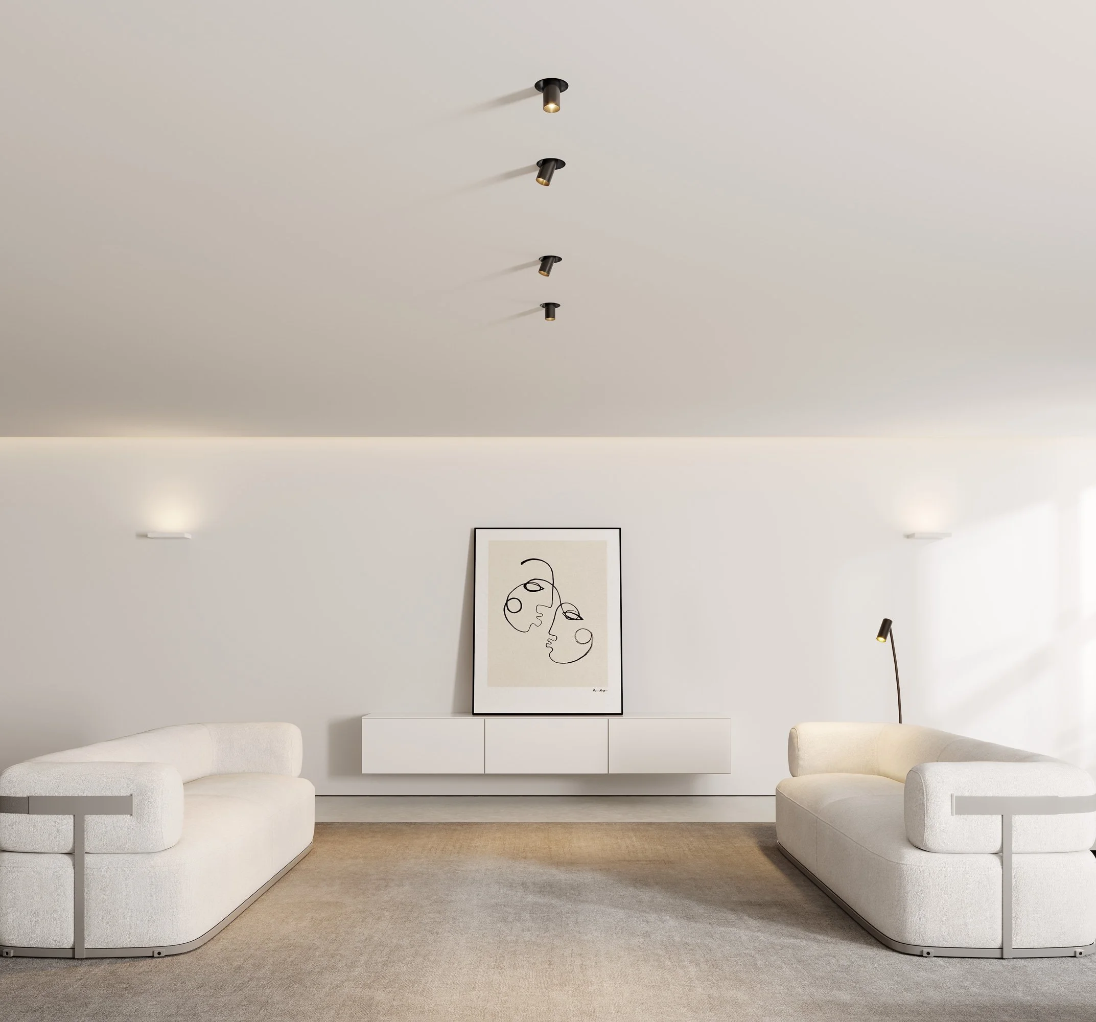 Interno di un soggiorno minimalista con divani bianchi, un quadro astratto e luci a soffitto nere.