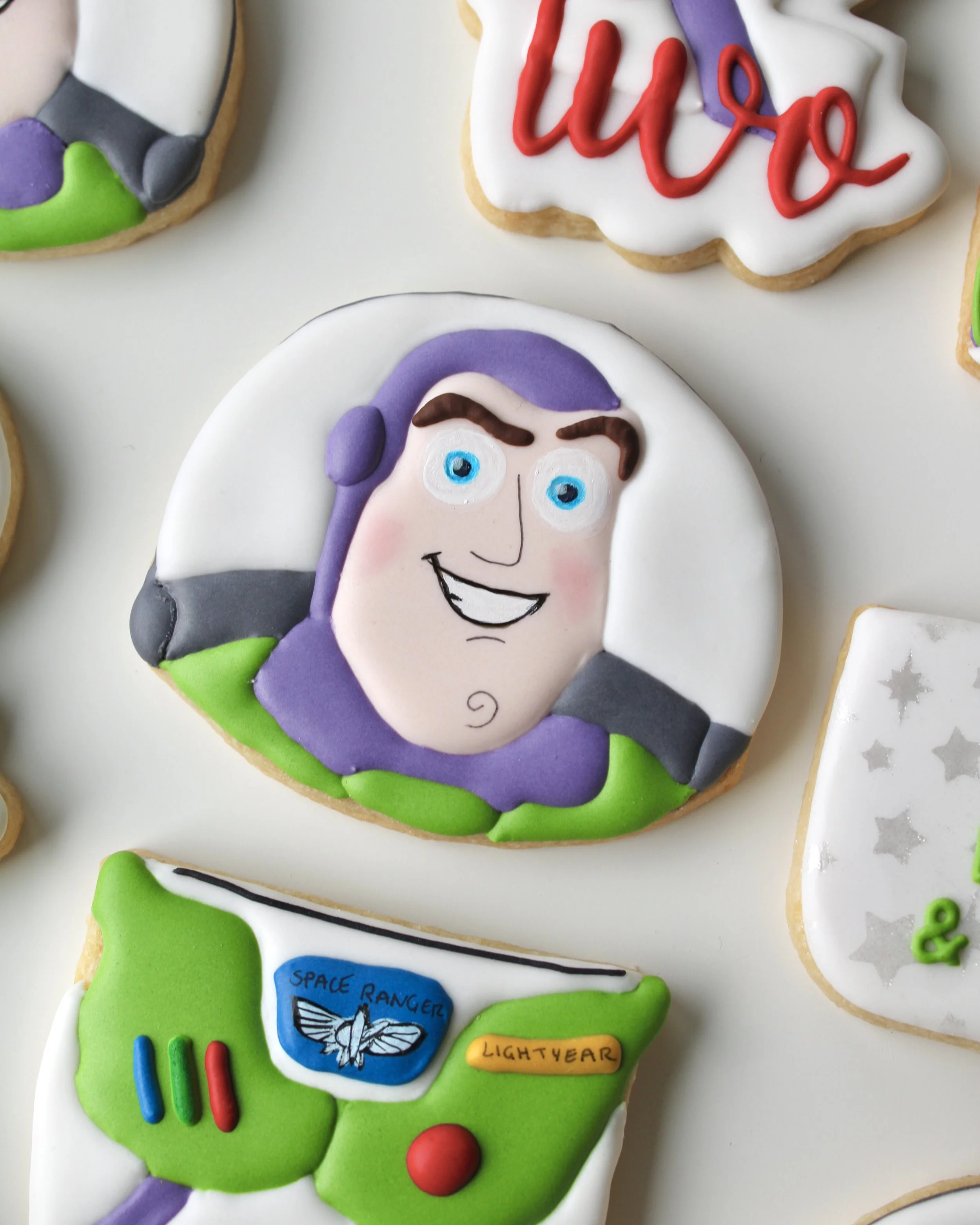 Close up of Buzz Lightyear royal icing cookie