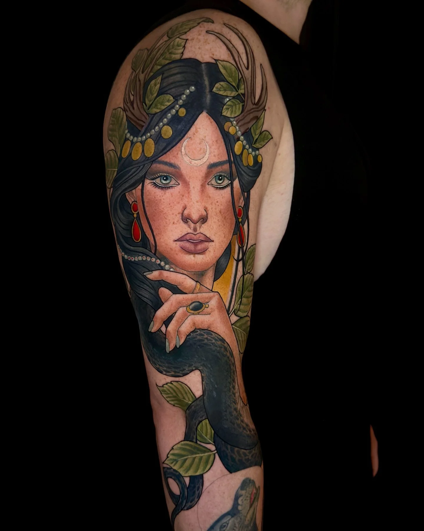 Illustrative woman portrait tattoo with botanical details by Brisbane artist Chris Strik.