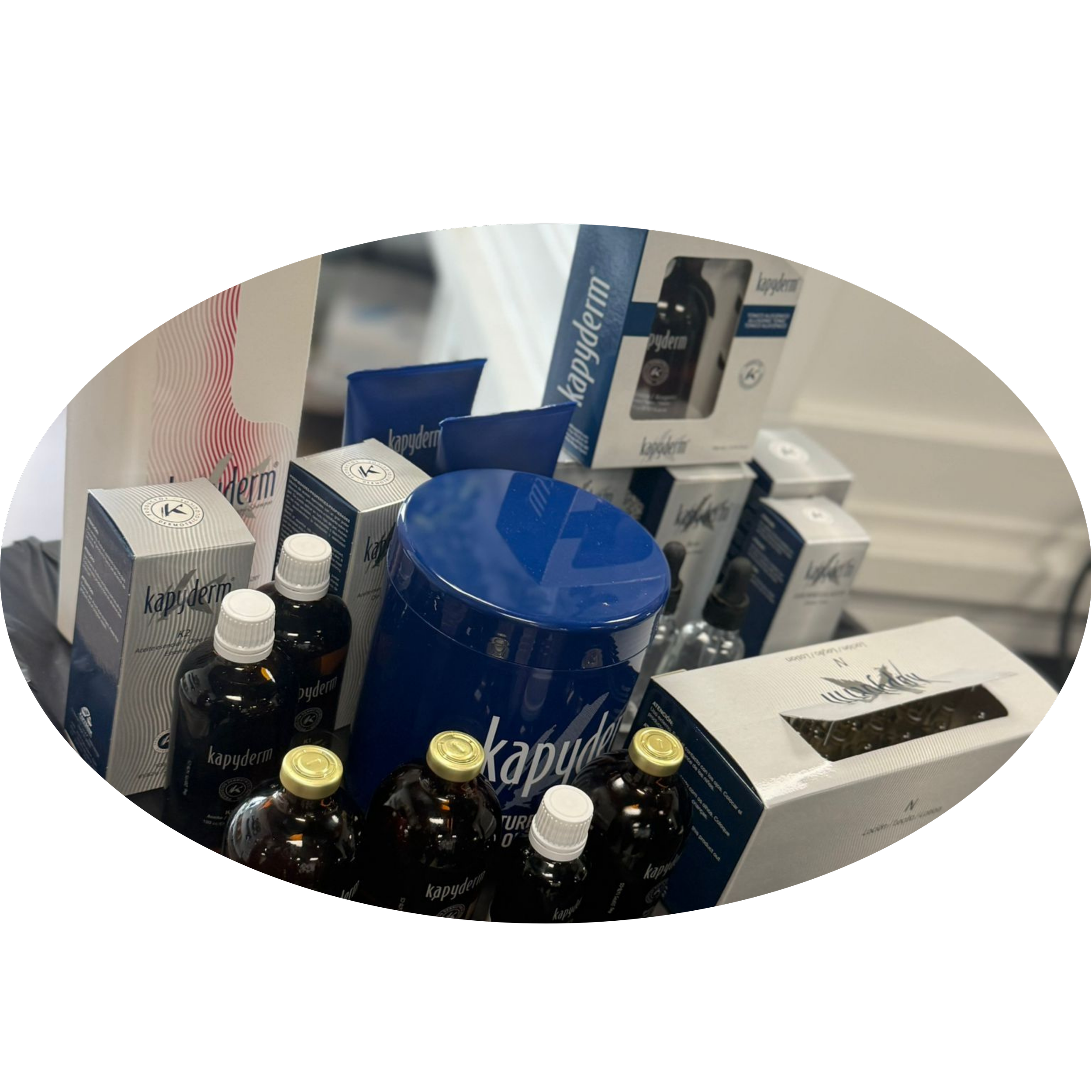 Pharmacy shelf displaying boxed medication and medication bottles, including Kapyderm