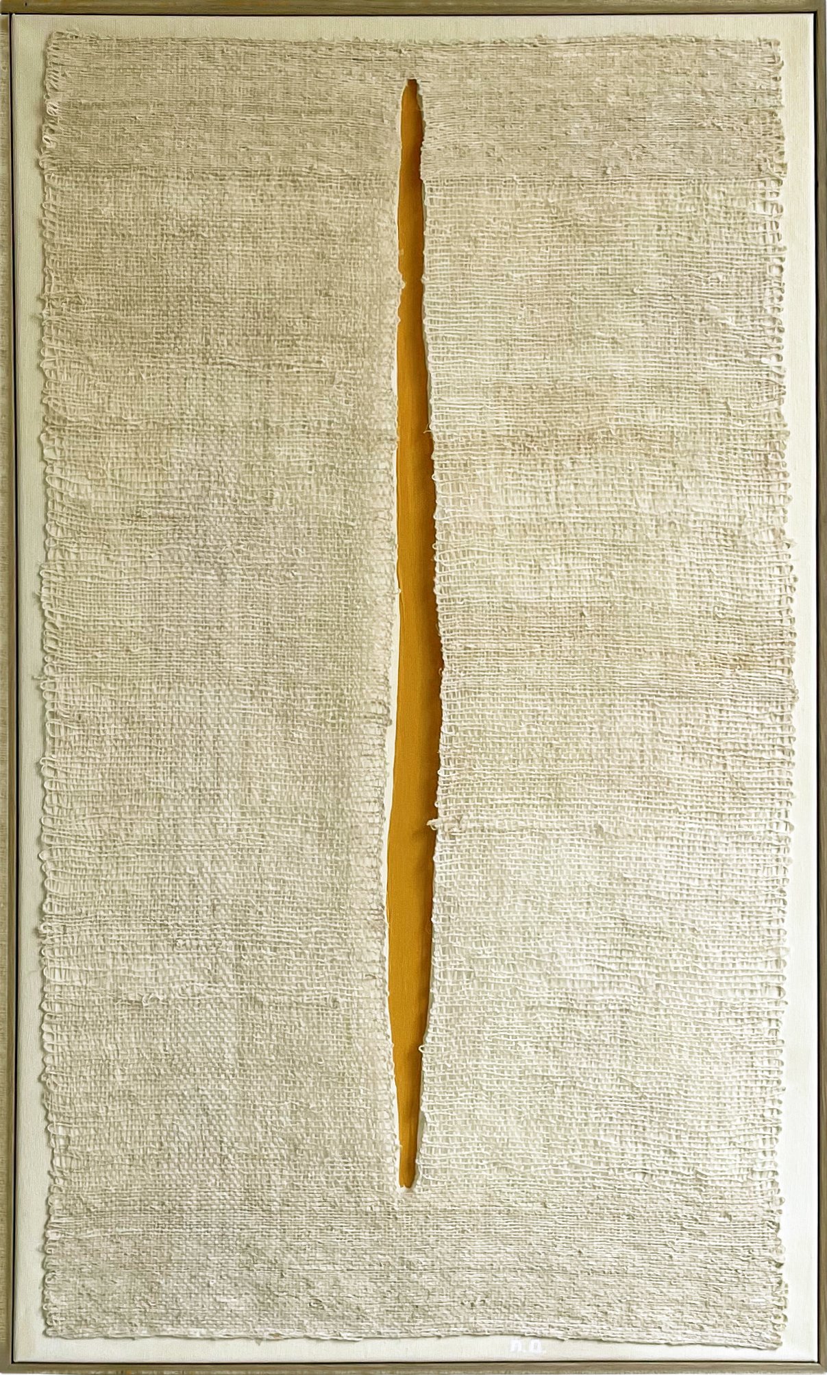 Gap V by Aggeliki Dimitriadou. Hand-woven hemp fiber layered over yellow acrylic on canvas. The vertical opening in the weaving reveals a bold field of color, exploring the tension between textile and depth.