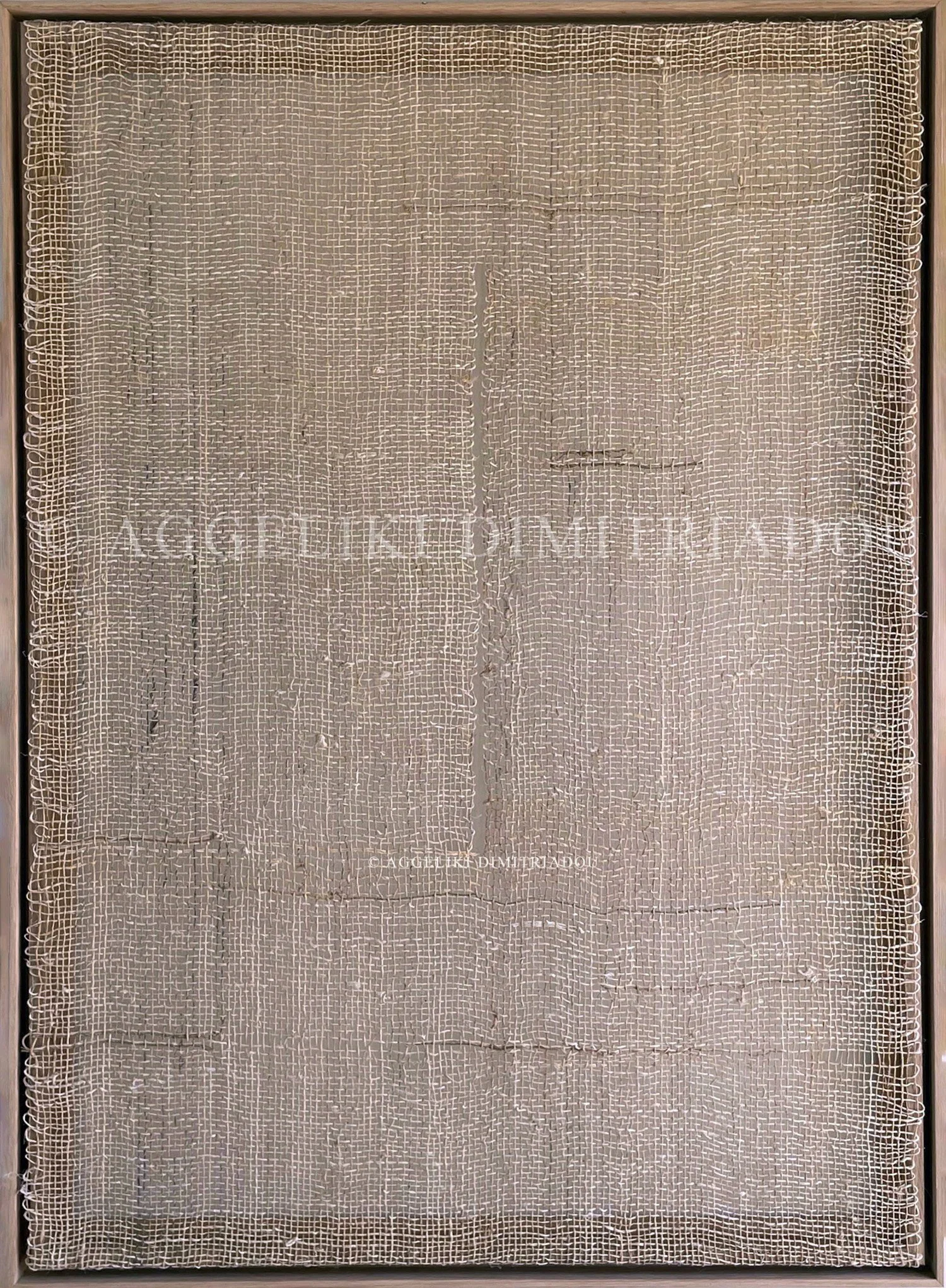 Gap III by Aggeliki Dimitriadou. Minimalist fiber art from the Gaps series. Features raw hemp weaving on a wooden frame, emphasizing the interplay of light and shadow through the textile.