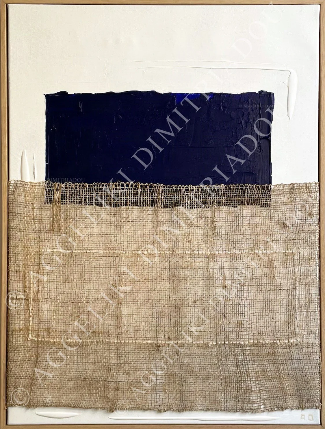 Minimalist mixed media artwork "Synthesis I" by Aggeliki Dimitriadou, featuring a custom hemp weaving integrated into a white canvas with a bold deep blue acrylic field and thick impasto textures.