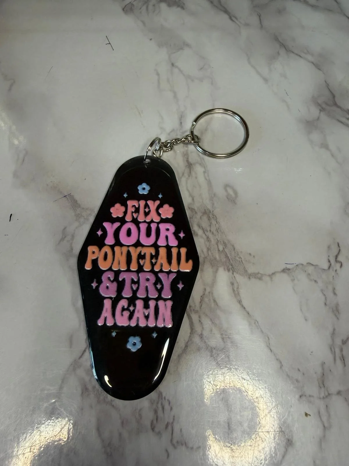 Fix your ponytail and try again keyring