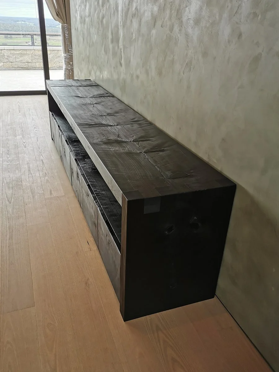Scorched Buffet in scorched Norfolk Island Pine, angled corner view in lifestyle setting - Nathan Day Design