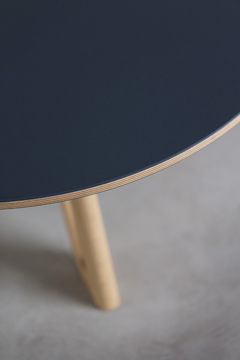 Quarterlight Coffee Table in a navy laminate top with solid timber leg detail - Nathan Day Design