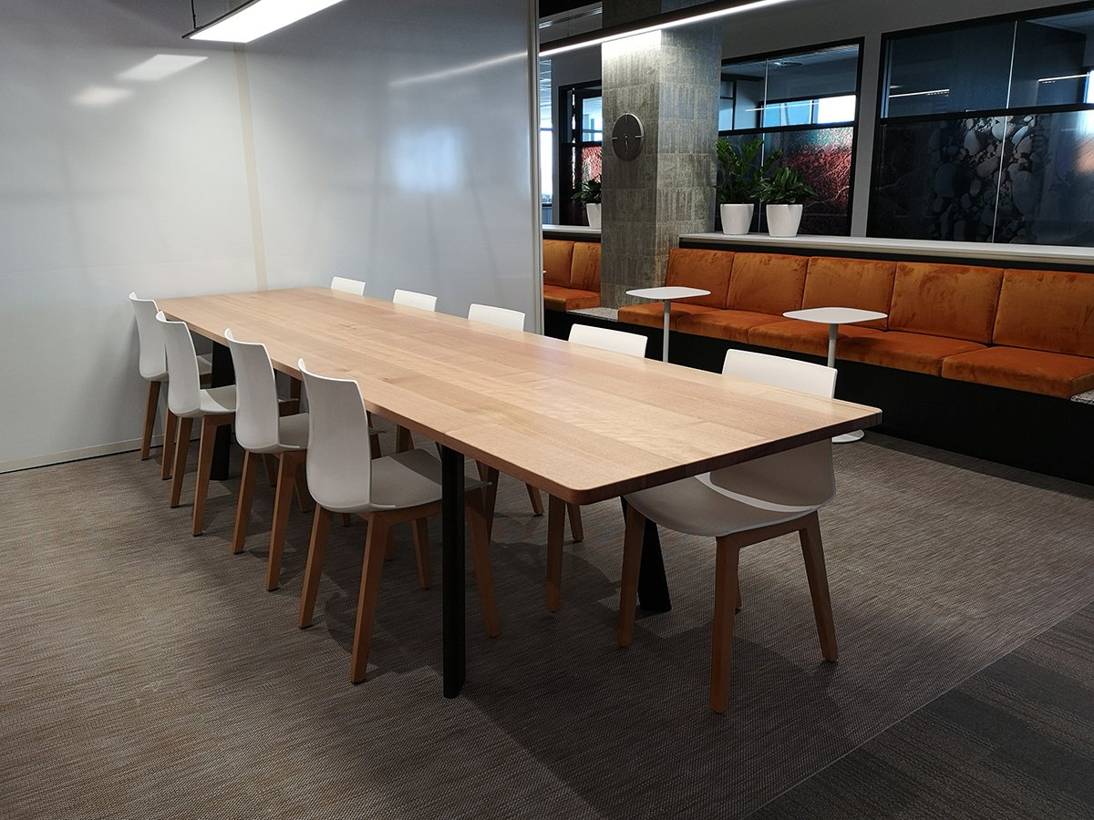 DWER custom furniture in WA Blackbutt - Nathan Day Design, casual dining table with mixed seating in bright breakout space