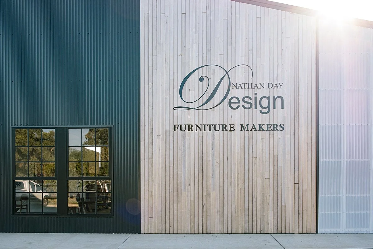 Nathan Day Design workshop exterior signage on the timber-clad furniture making studio in Yallingup, Western Australia