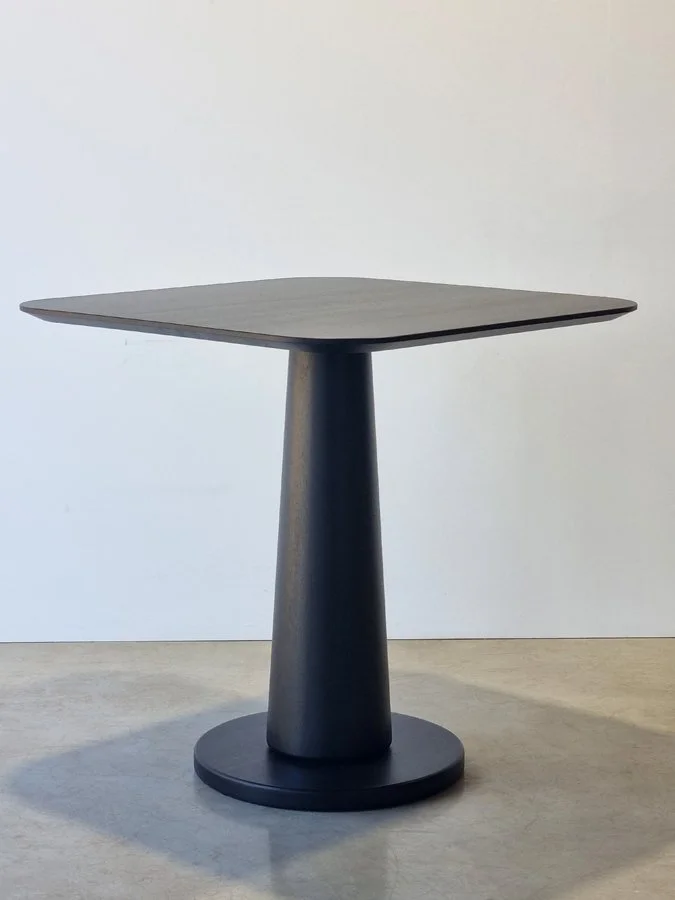 Majestic Cellar Table in ebonised Jarrah, full front view in plain studio setting - Nathan Day Design