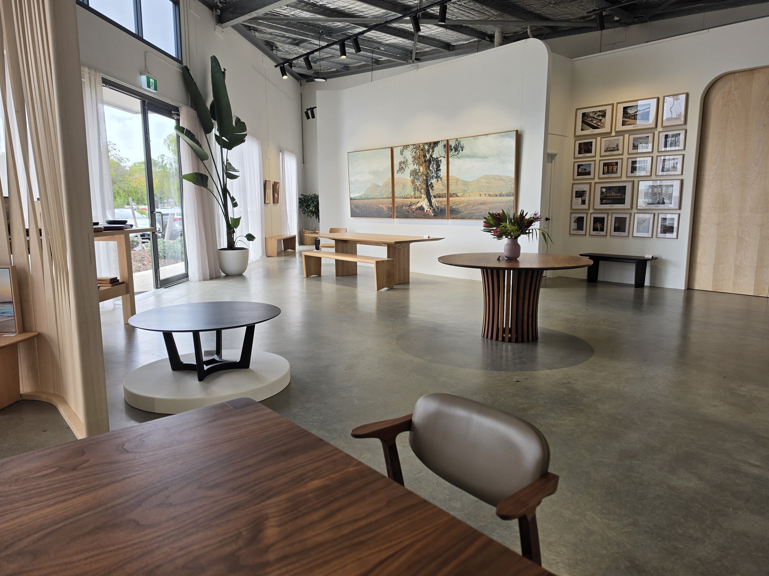 Interior of Nathan Day Gallery showing furniture, art and objects on display