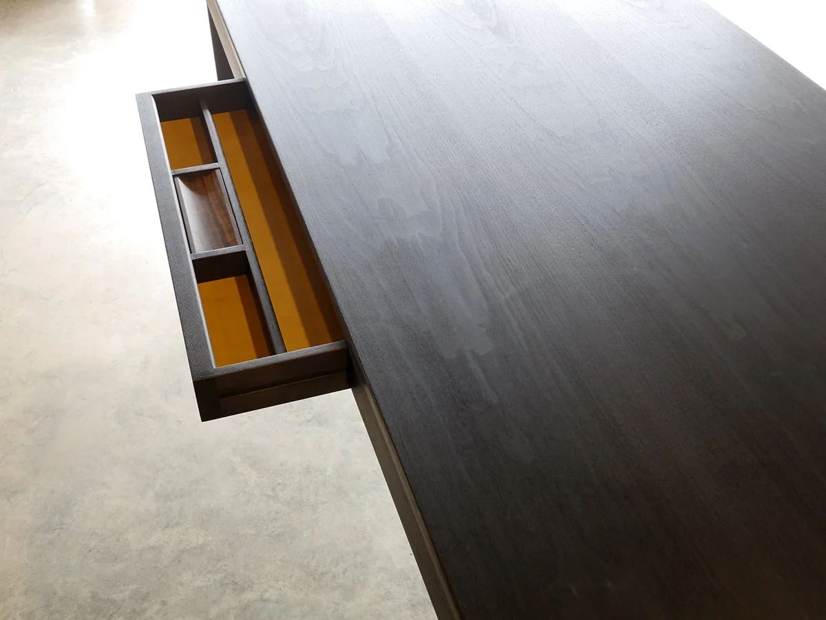 Irvine Desk in Walnut, minimalist frame-leg design - Nathan Day Design, close-up of open drawer with compartmentalised organiser tray