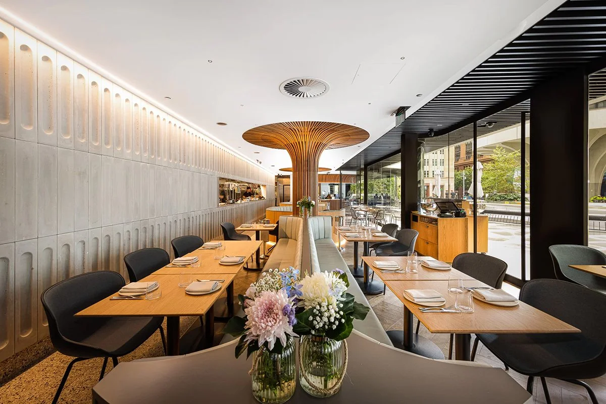 Wide interior view of Aalia Restaurant Sydney fitout showing multiple custom Oak tables and a sculptural timber ceiling feature - Nathan Day Design