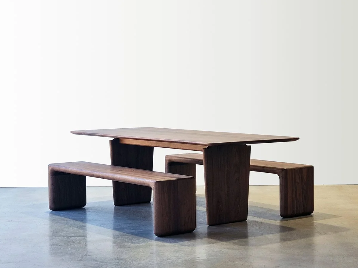 Morey Table in Walnut with matching benches, bright studio setting - Nathan Day Design
