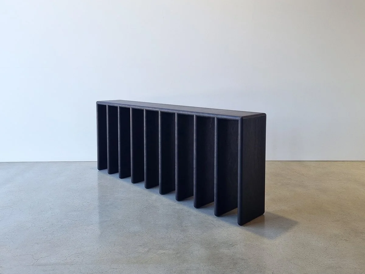 Millipede Console in ebonised Jarrah, front angled view in studio setting - Nathan Day Design